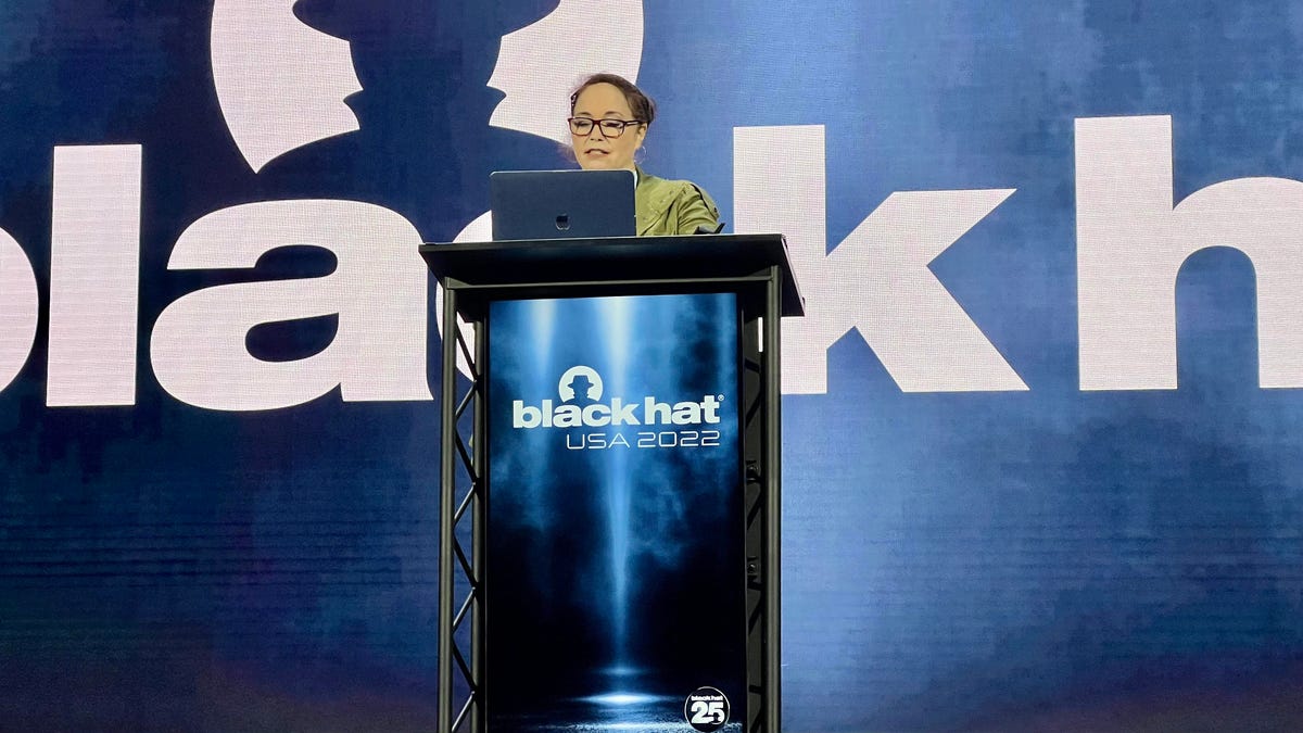 A picture of Kim Zetter speaking at Black Hat.