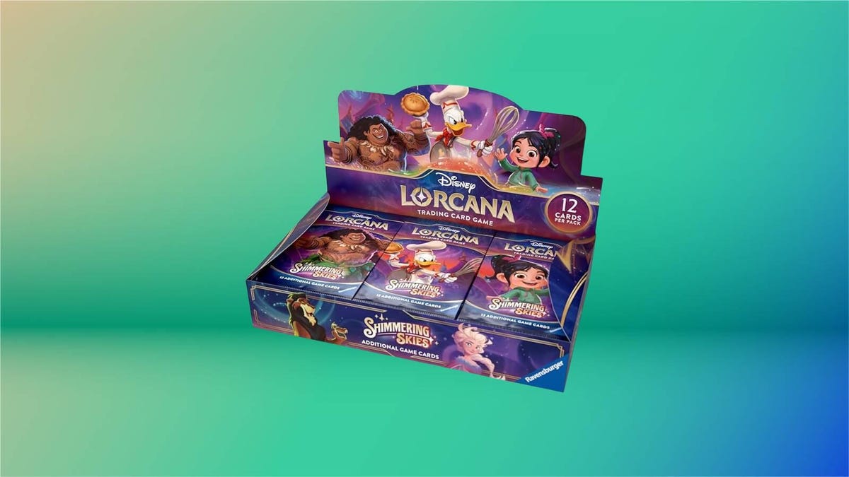 A boxed set of Disney Lorcana cards on a green gradient background