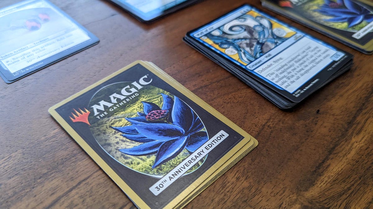 The back of a Magic: The Gathering card with a black lotus on it