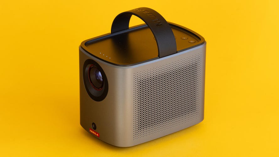 Anker Nebula Mars 3 Air portable projector is shown against a yellow background.