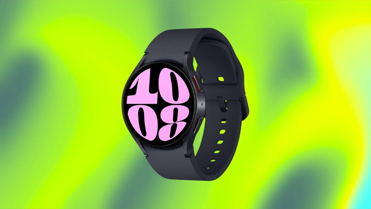The black Samsung Galaxy Watch 6 over a green and bright yellow abstract background.