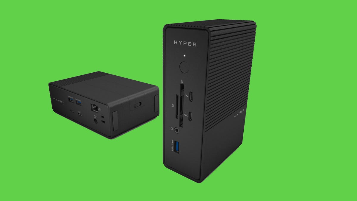 Hyper's HyperDrive Thunderbolt 5 dock, a dark brick-shaped accessory with several connection ports, shown against a purple background