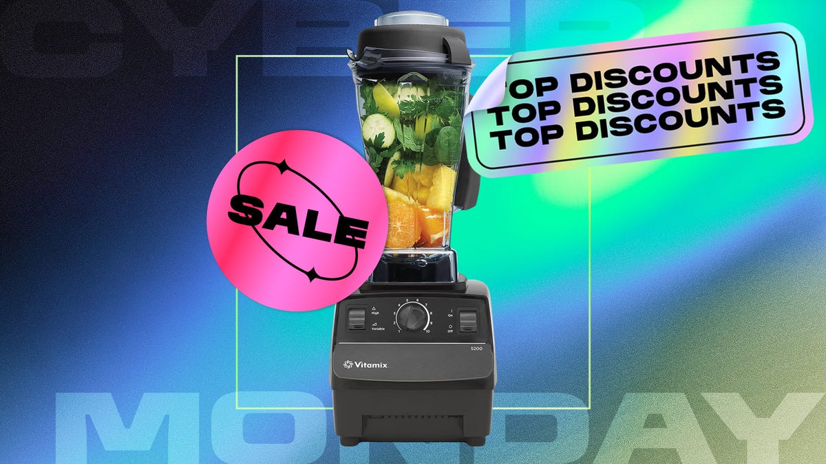 Vitamix blender with black base against dark blue, blue and green CNET background.