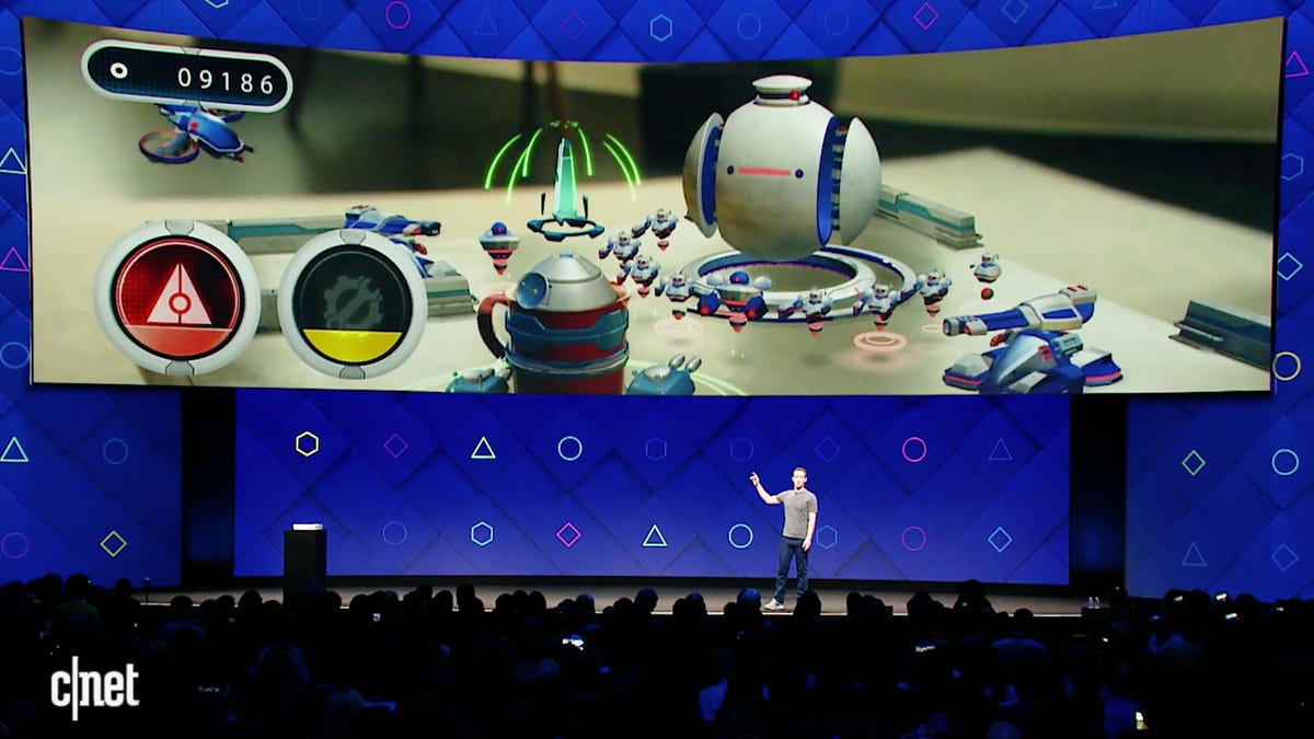 Facebook CEO Mark Zuckerberg shows AR technology that turns a waiting-room table into a videogame battlefield.