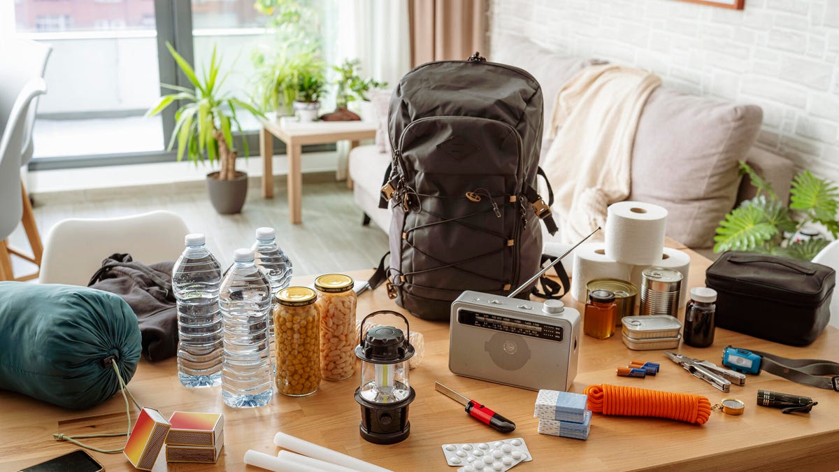 Emergency equipment to face crisis and disasters. Water, food, first aid kit, tools and another items needed to survive