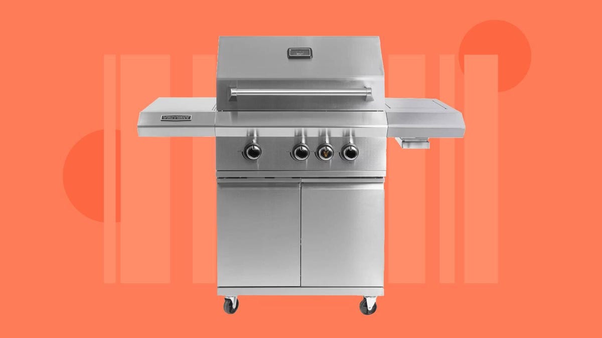 A Victory-3-burner grill against an orange background.