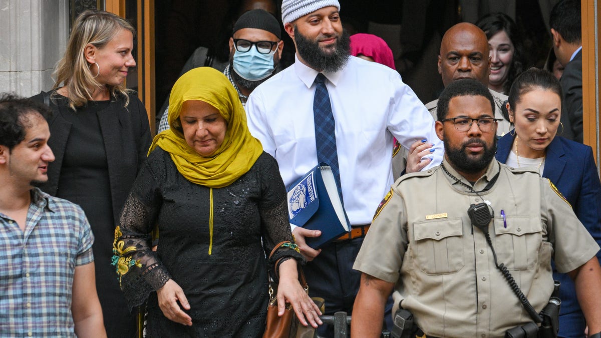 Adnan Syed leaving the courthouse after his murder conviction was vacated