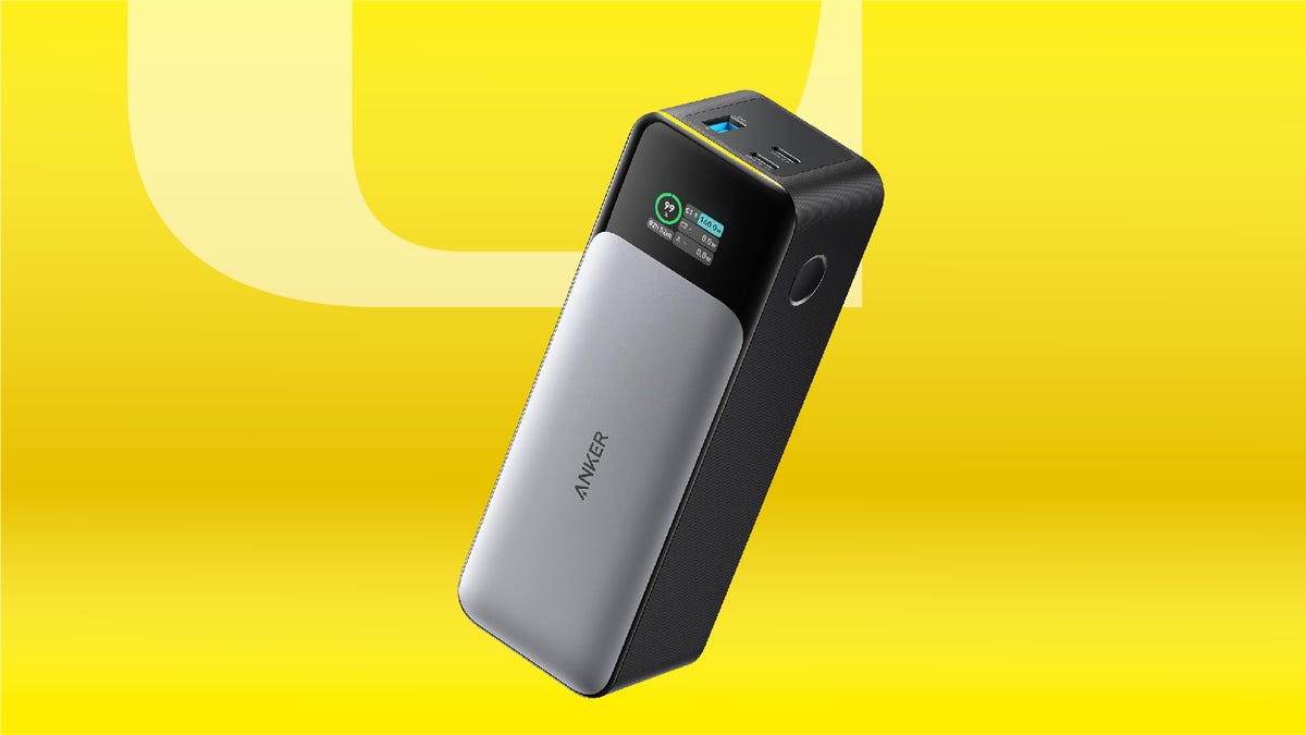 Anker 737 power bank on yellow CNET background