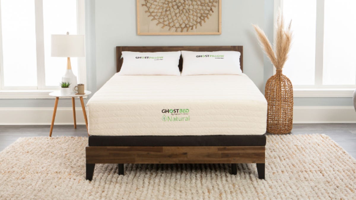 GhostBed natural mattress in a bedroom.