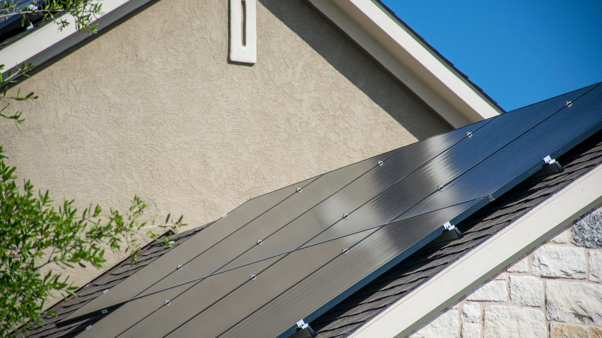 Austin home with roof covered in solar panels.