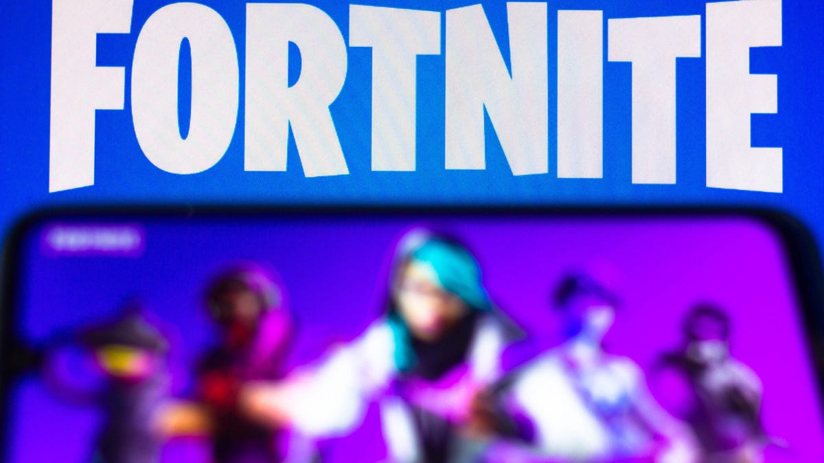 Fortnite logo over a phone