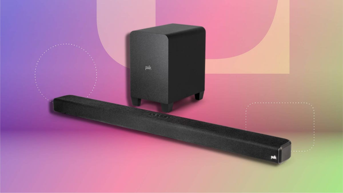 A sleek black soundbar paired with a compact wireless subwoofer, set against CNET background