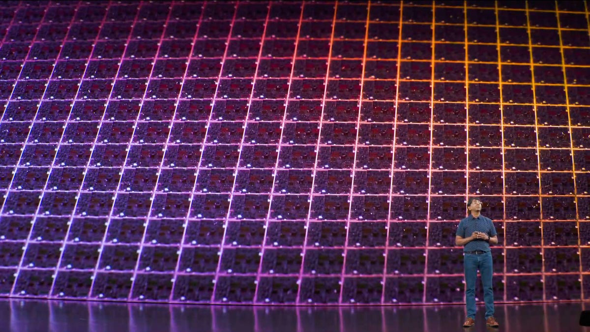 Sri Santhanam, vice president of silicon engineering, shows off Apple's new A13 smartphone chip.