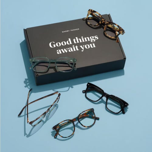 Warby Parker glasses surrounding a home try-on box that says "good things await you" over a light blue background.