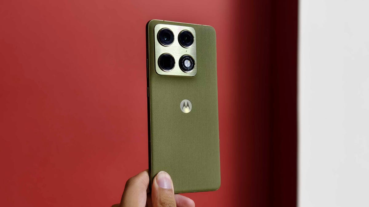 Prakhar Khanna holding the Motorola Signature.