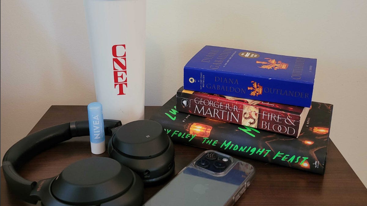 The books, water bottle and headphones I need on my nightstand at night.