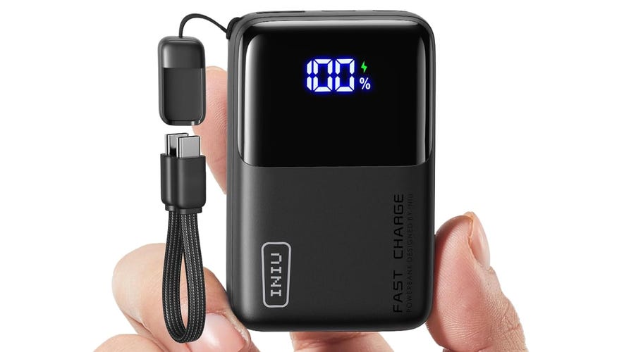 Image of black version of Iniu mini power bank in hand