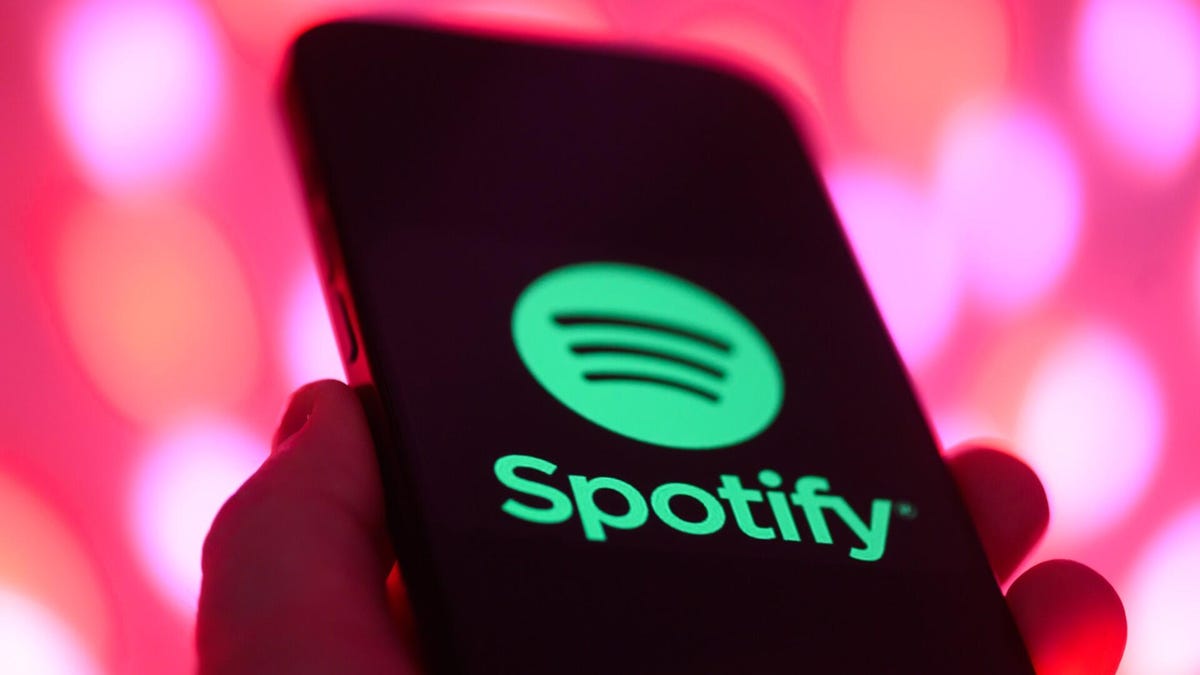 Spotify logo on mobile phone