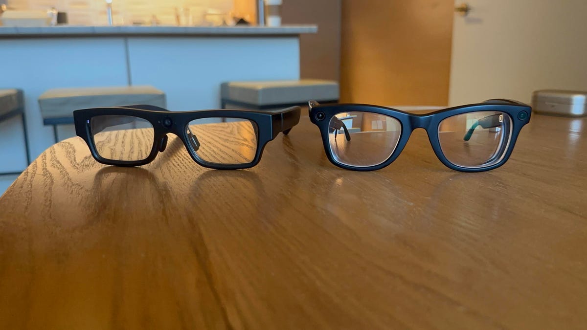 Two pairs of smartglasses on a table