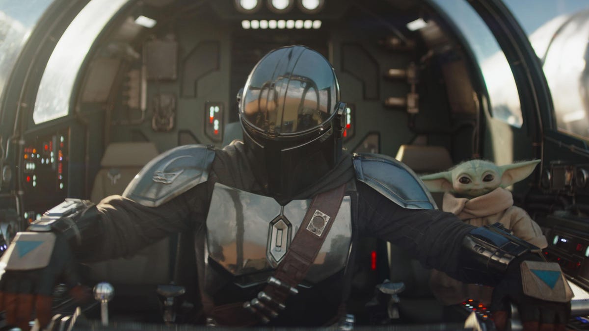 mandalorian and grogu in a spaceship in new star wars movie