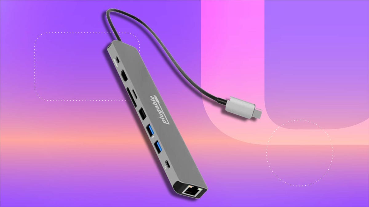 Slim 10-in-1 USB-C hub with multiple ports and a short cable on CNET background.