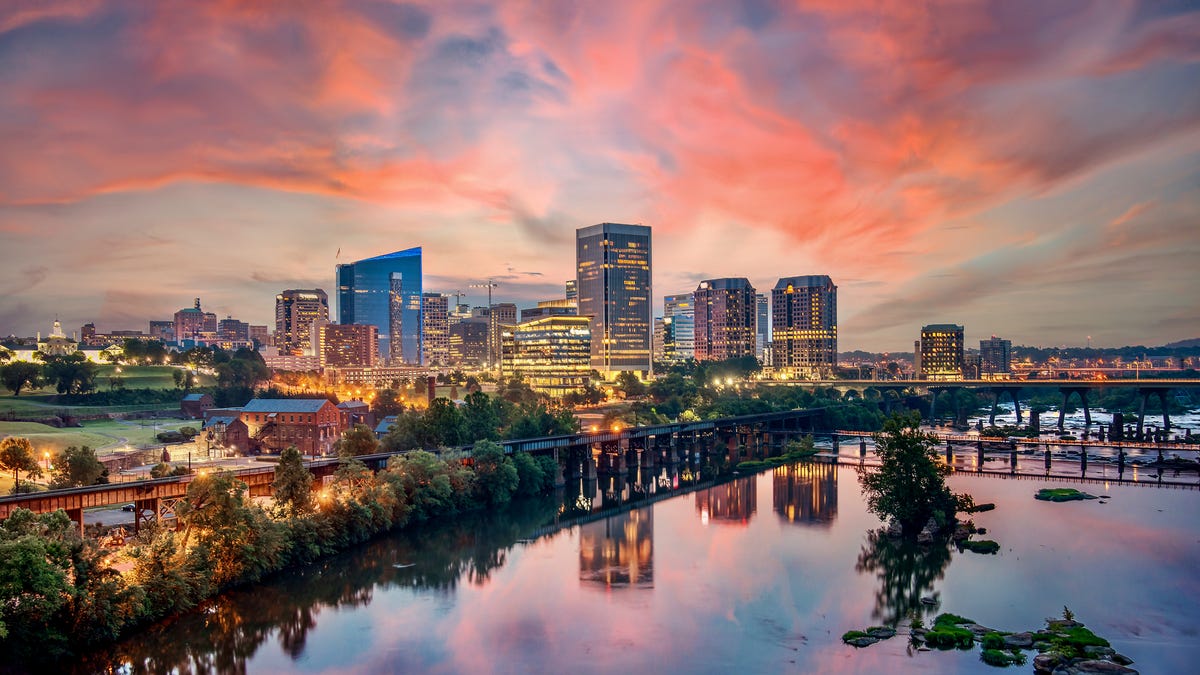 Orange and purple sunrise over the Richmond, Virginia skyline.