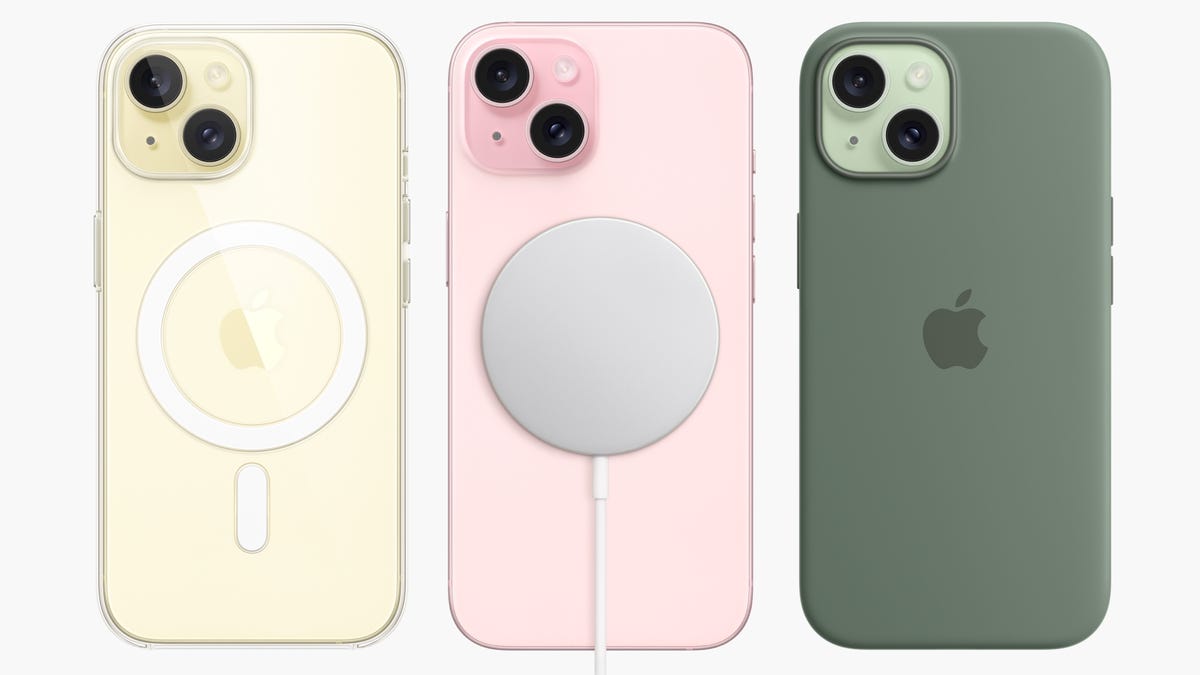 The iPhone 15 attached to a MagSafe charger.