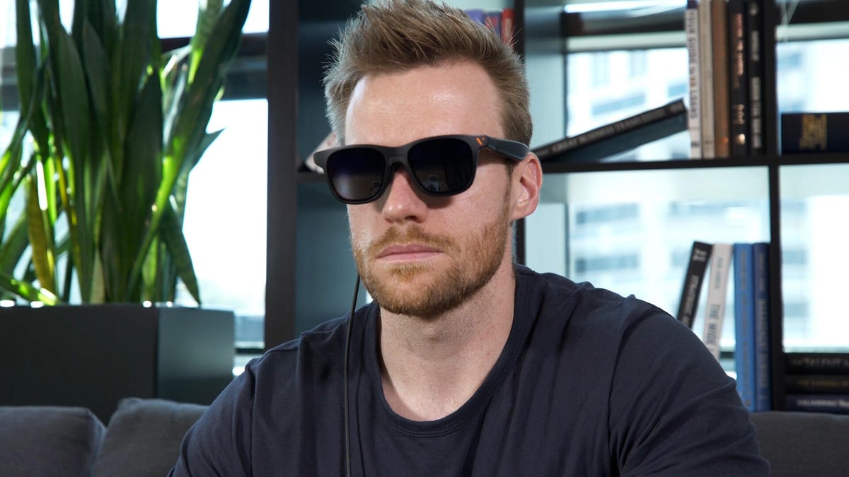 Man wearing Viture Pro XR glasses