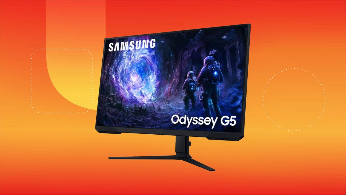 A Samsung monitor against an orange gradient CNET background.