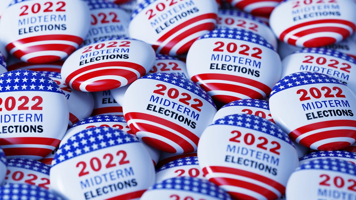An image of "Election 2022" and American flag buttons.
