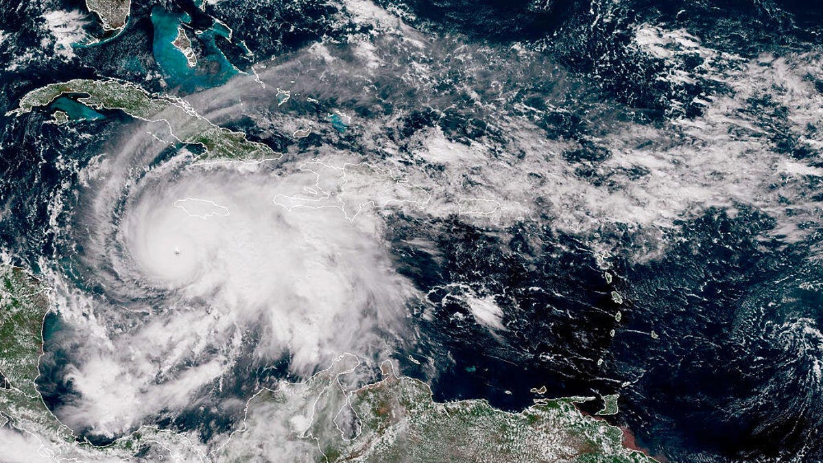 satellite image provided by the National Oceanic and Atmospheric Administration (NOAA), Hurricane Melissa churns northwest through the Caribbean Sea captured at 17:00Z on October 27, 2025.