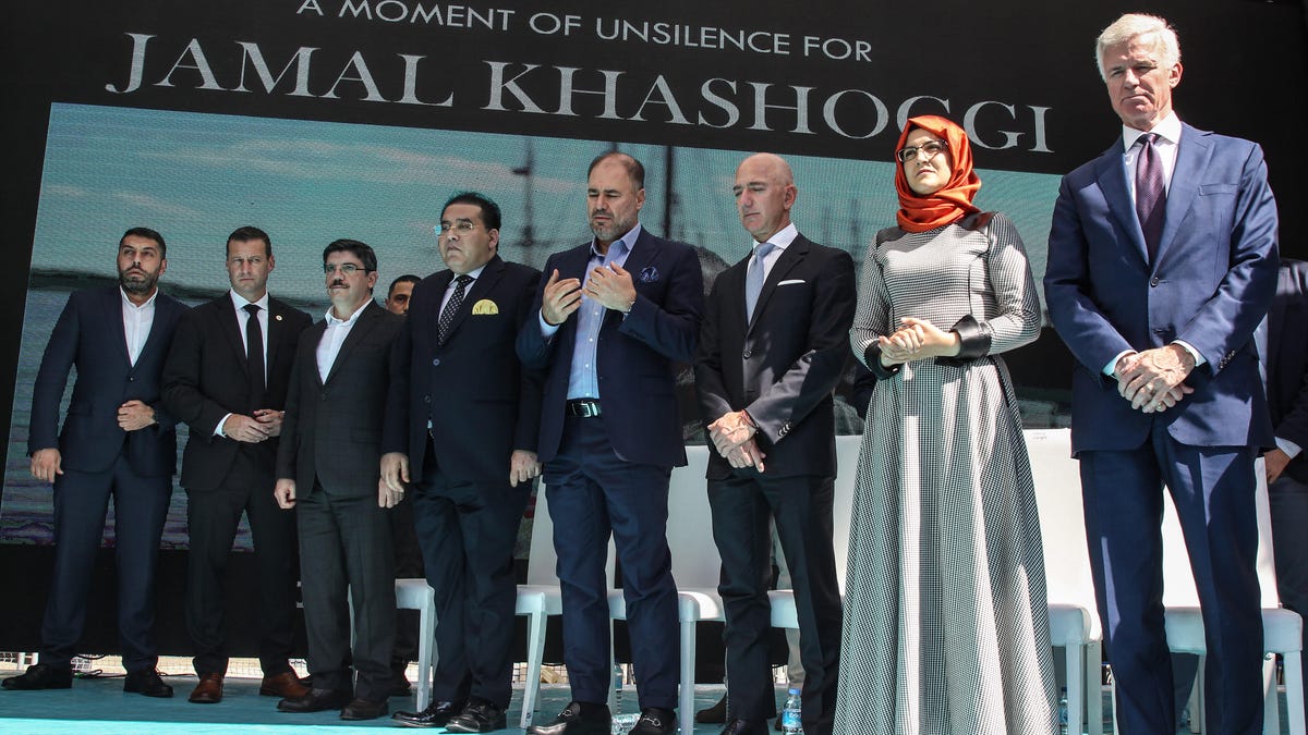 Jeff Bezos takes part in a memorial service for Jamal Khashoggi