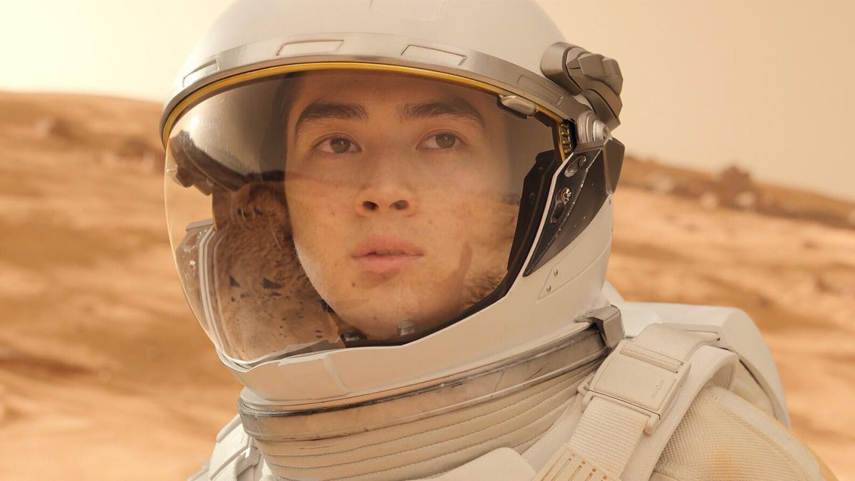 An Asian man stands in an astronaut suit in a production still for the Apple TV show For All Mankind.