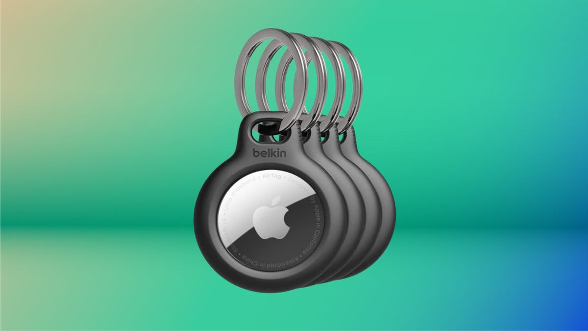 Four Belkin keychains with Apple AirTags in them