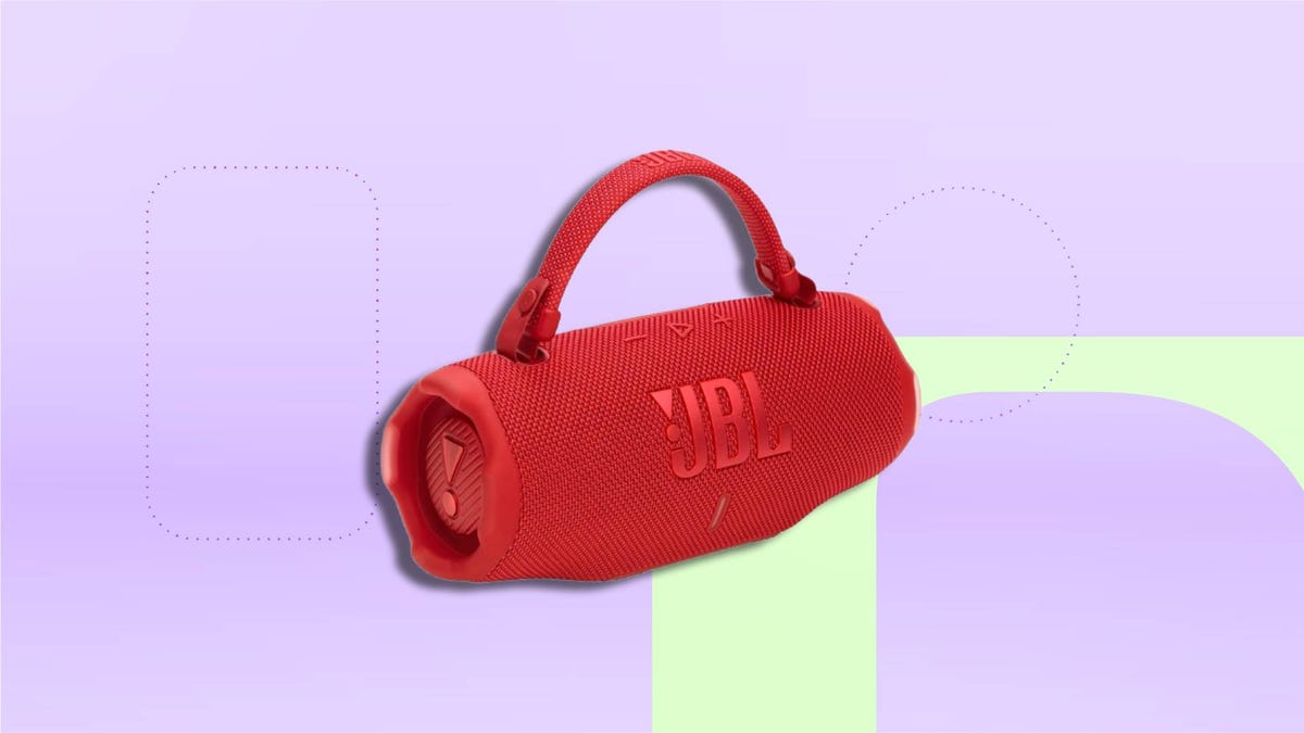 A red JBL speaker on a bright purple background.