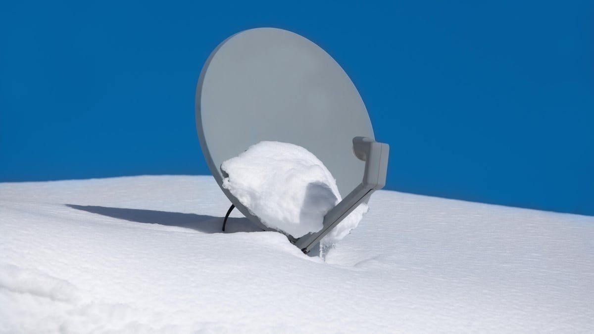 Snow on a satellite dish
