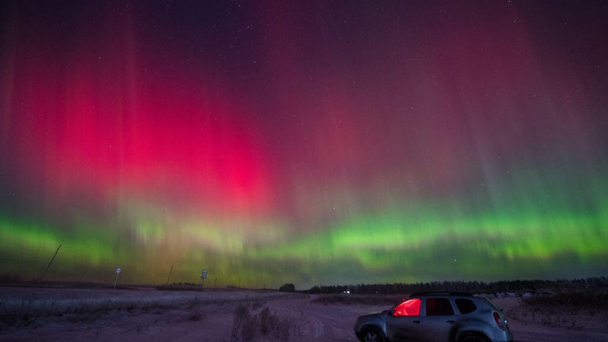 The aurora borealis stripes the sky in vibrant colors