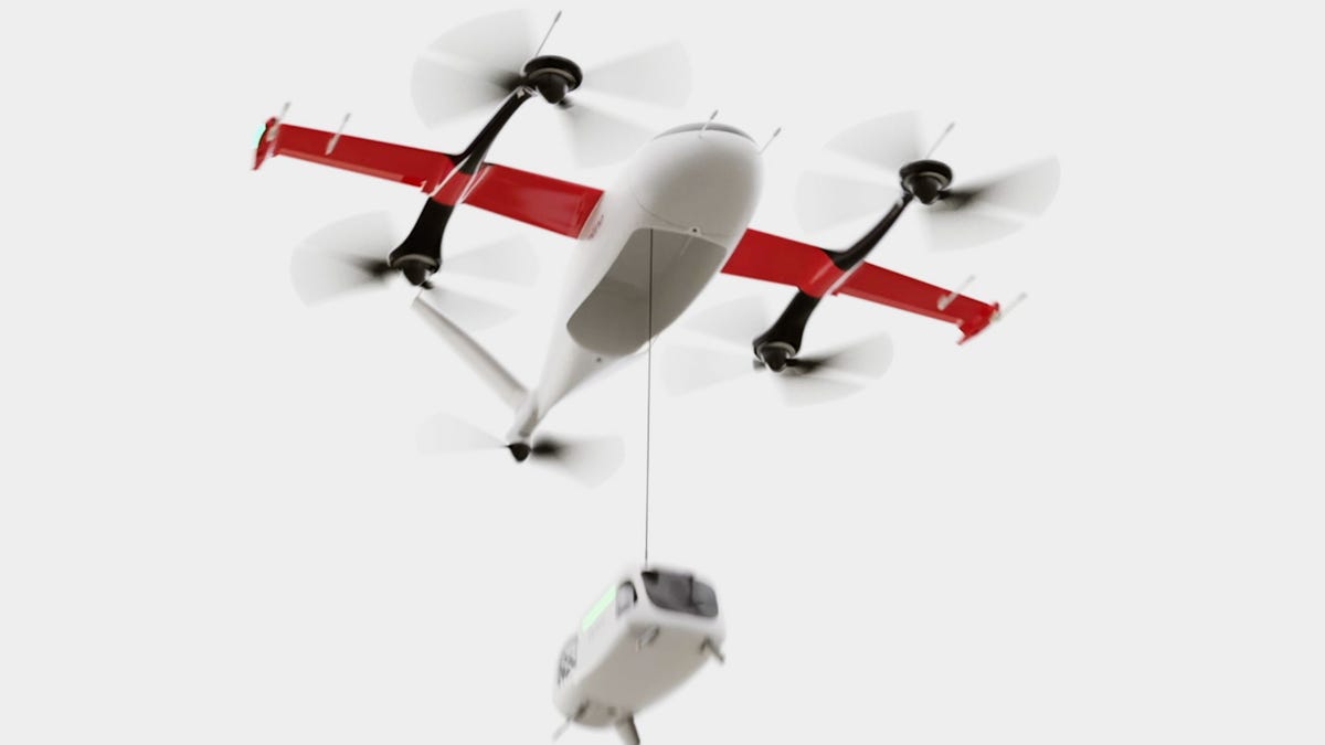 A computer rendering of a Zipline Platform 2 drone lowering its delivery module, called a droid, by cable to deliver a packages onto a precise spot.
