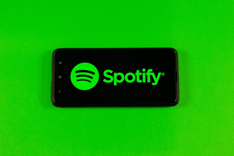 Spotify's logo on a phone