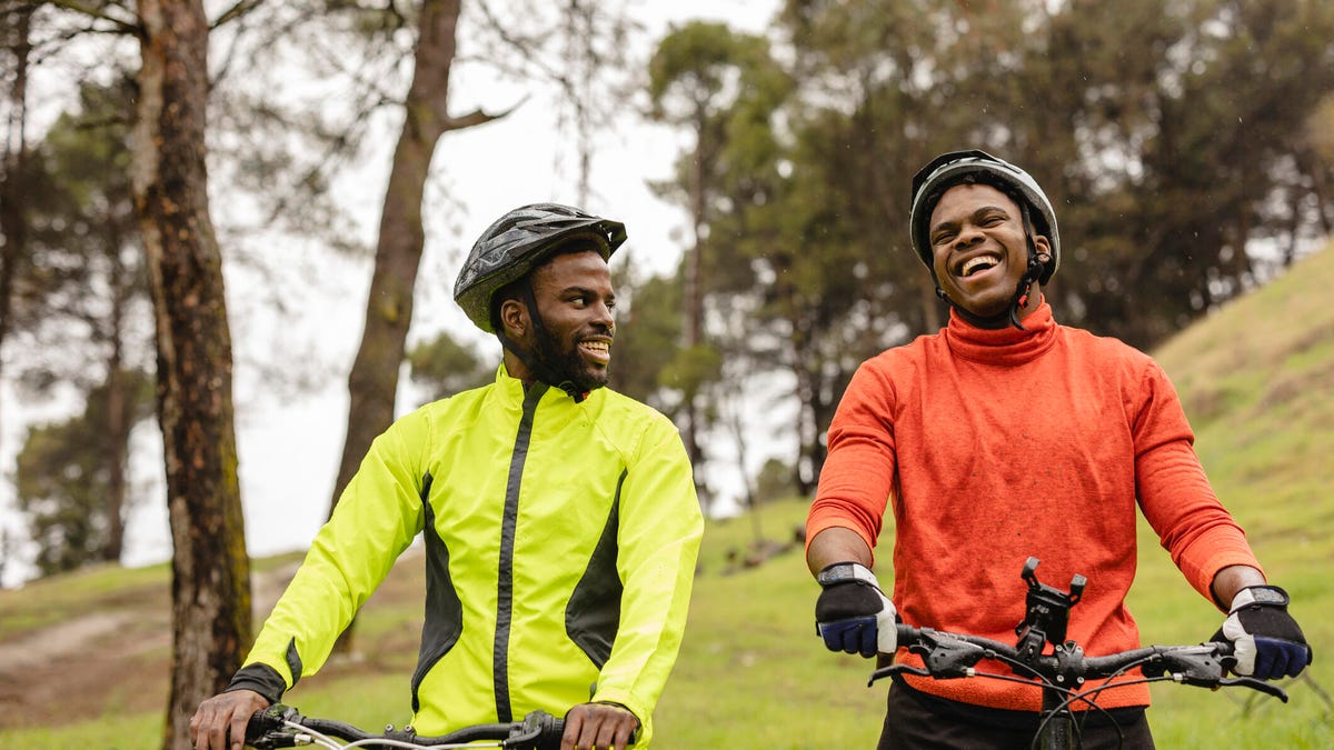 Two men on bicycles.