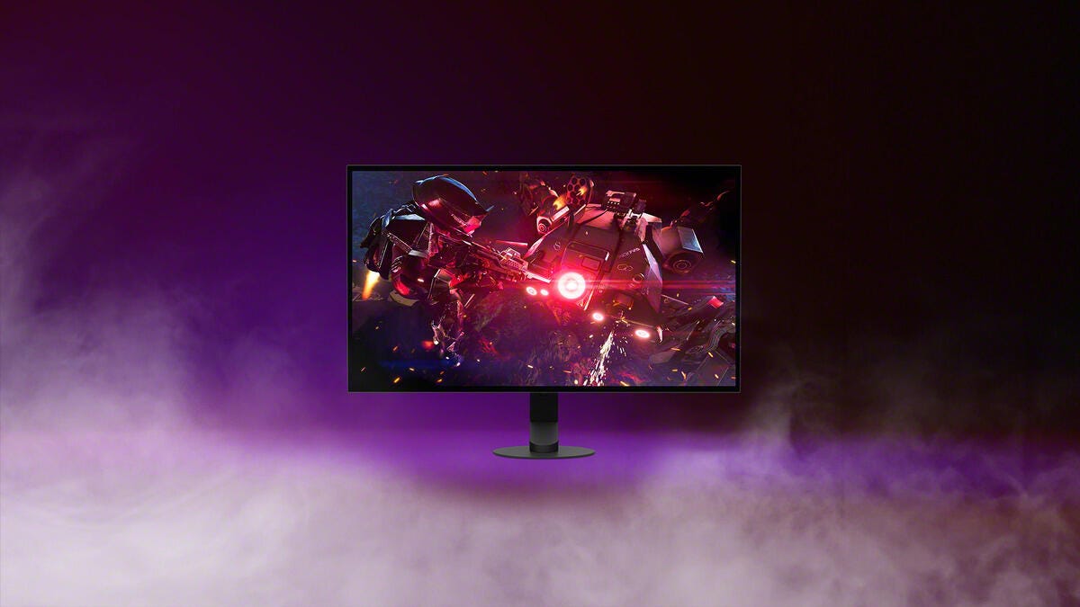 The monitor against a purple background