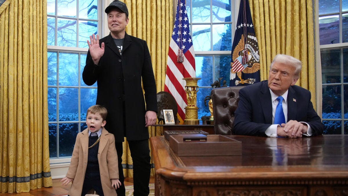 A photo of Elon Musk and his son X in the Oval Office with President Trump gettyimages-2198968410