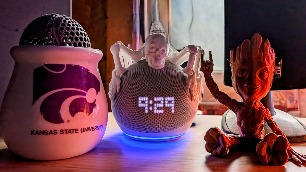 An Amazon Echo rests on a table.