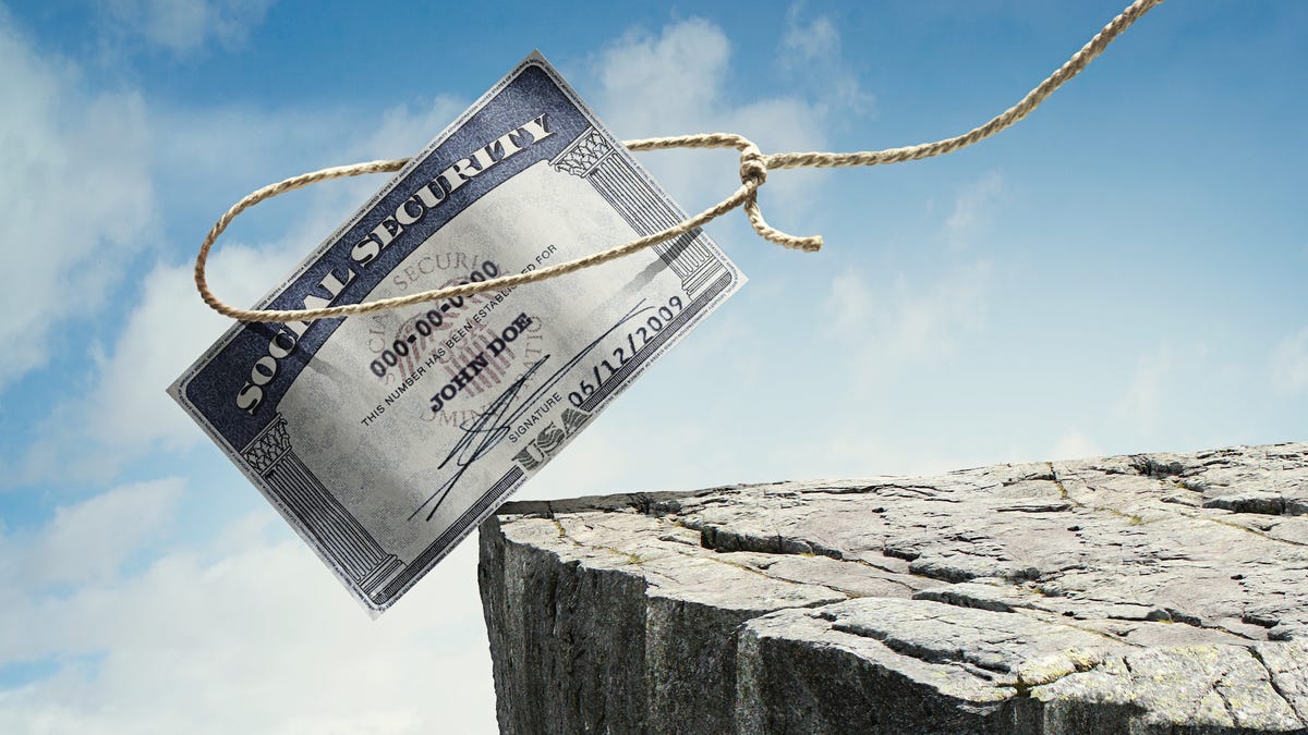 A Social Security card going over a cliff
