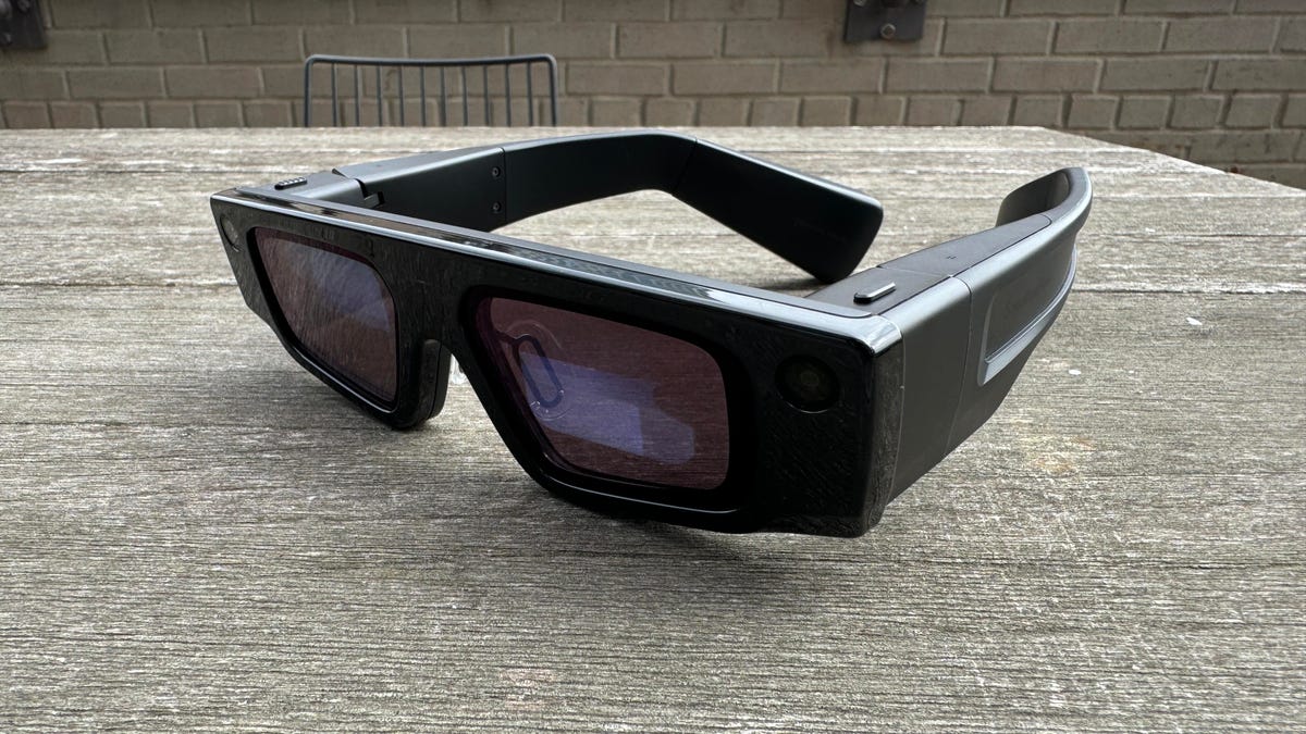 A bulky pair of AR glasses made by Snap on a table