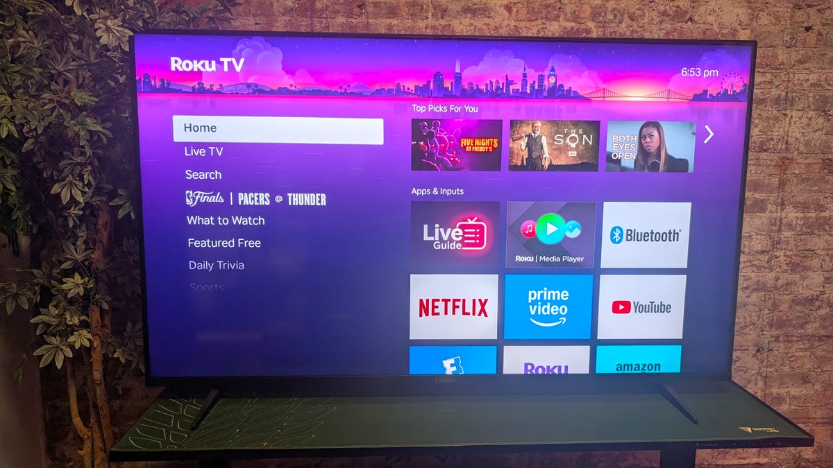 TV showing purple Roku home page