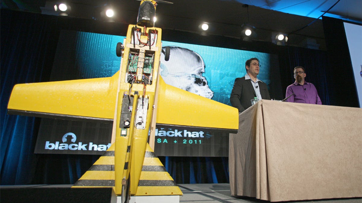 caption: Mike Tassey (l) and Rich Perkins (r) describe how they retrofitted a U.S. Army surplus target drone.