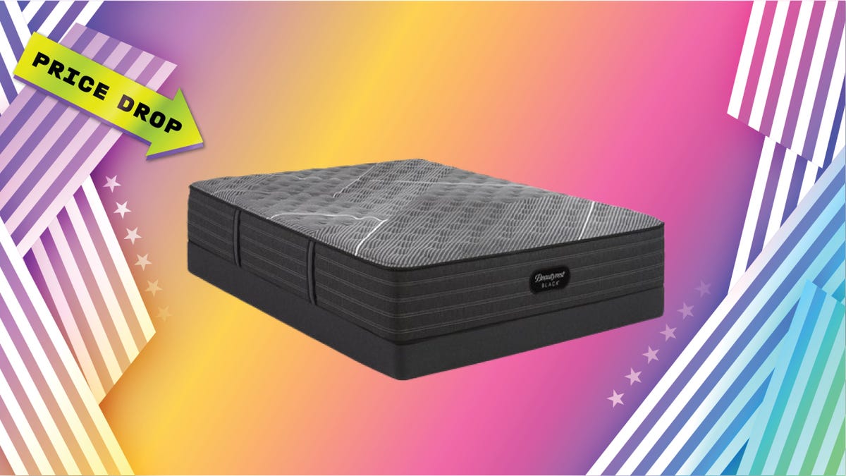 beautyrest mattress with sign saying price drop