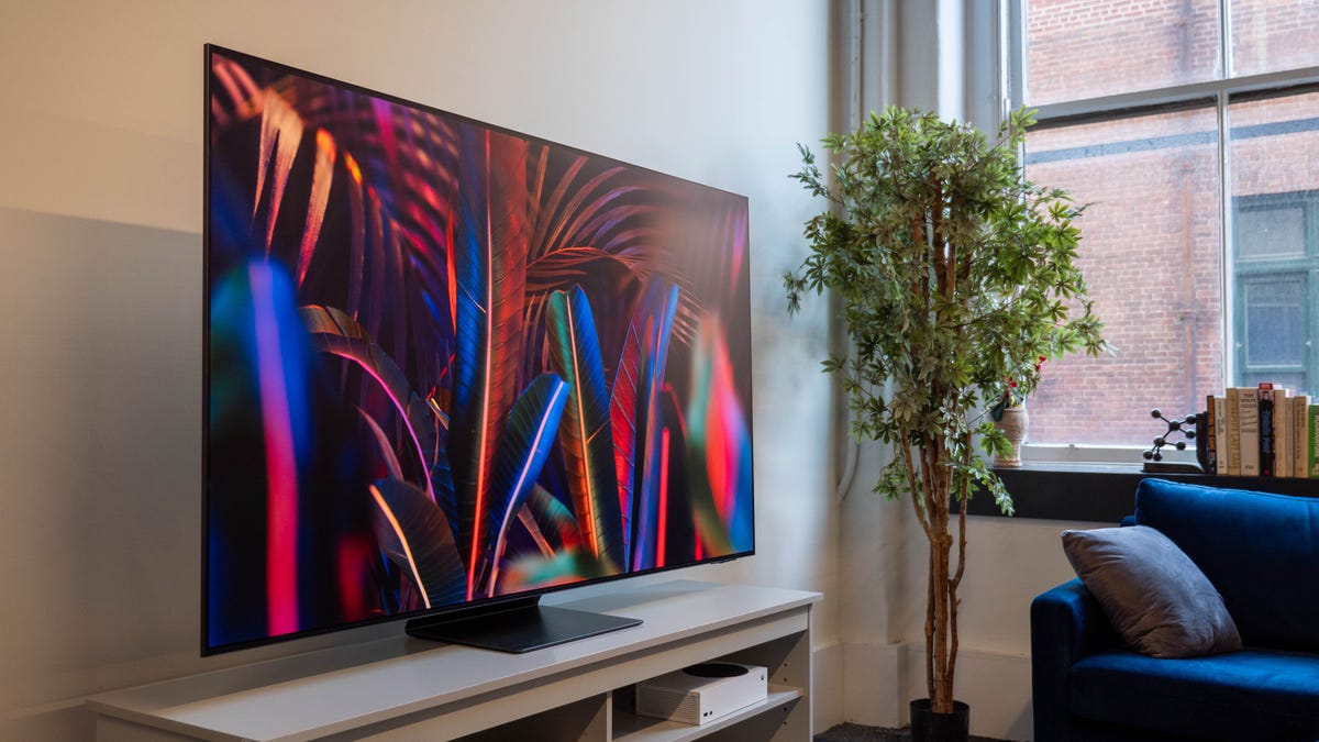 An OLED TV in a bright room.