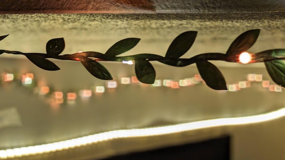 string lights along top of wall